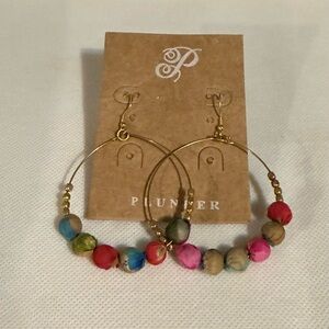 Gold-toned wire hoops adorned with multi-colored fabric-wrapped beads.